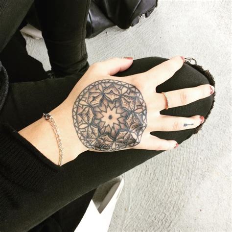 Small Stippling Style Hand Tattoo Of Flower Tattooimagesbiz