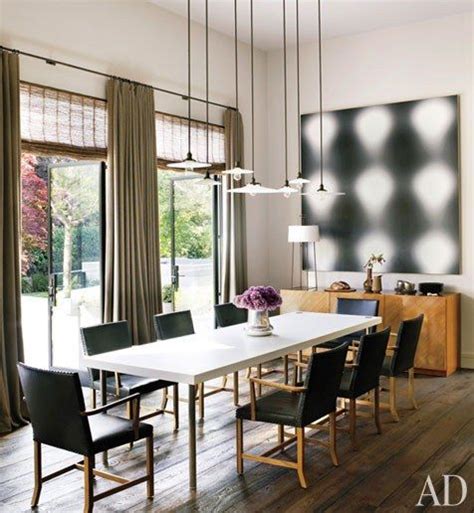 A Dining Area Featuring Vintage Pendant Lamps An Untitled Wayne