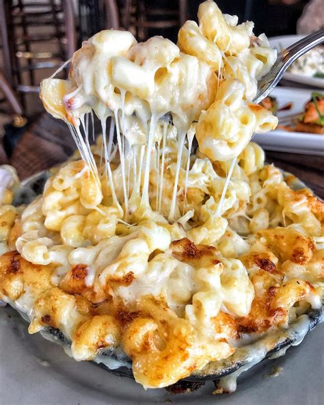Fancy, designer mac and cheese often costs forty or fifty dollars to prepare when you have so many exotic and expensive cheeses, but they aren't always the best tasting. Celebrating National Mac & Cheese day with this SKILLET ROASTED MAC + CHEESE from ...