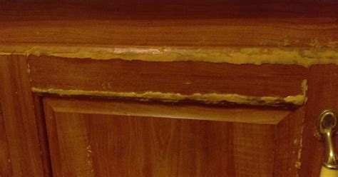 There are a few paints that work well with particle or cork board. Scuff Cabinets | Painting kitchen cabinets, Laminate kitchen cabinets, Refinishing cabinets