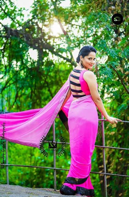 Anasuya Bharadwaj Latest Stills In Pink Saree