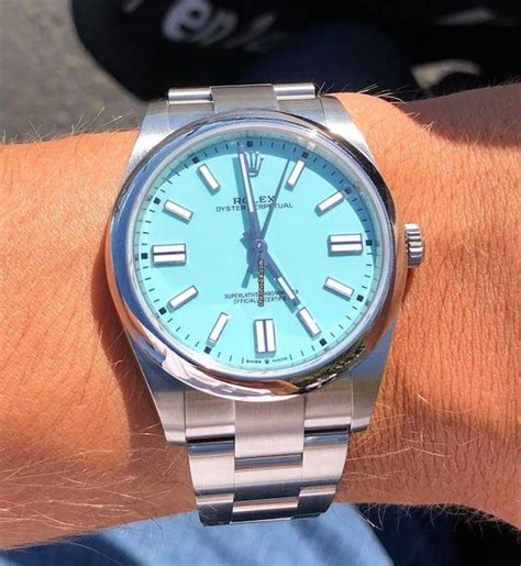 Fixed fluted 18kt white gold bezel. Rolex Oyster Perpetual 41 Blue Dial (Tiffany) NEW 2020 for ...