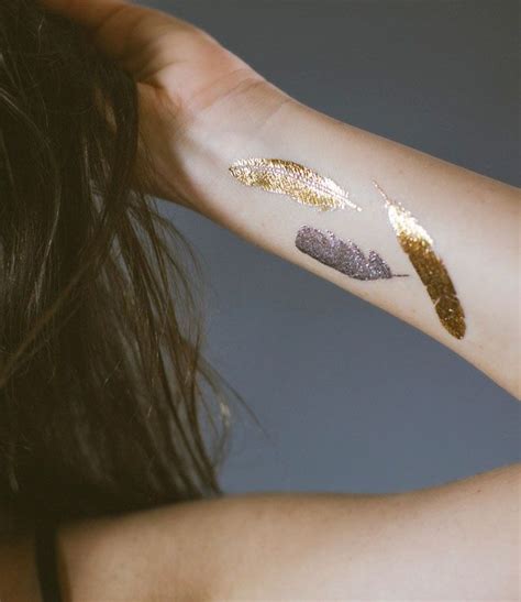 How To Wear Gold Leaf Gold Tattoo Metal Tattoo Feather Tattoos