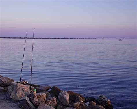 Fishing At Dusk Photograph By Roger Wedegis Fine Art America