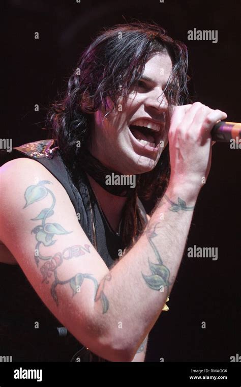 Singer Austin Winkler Of The Rock Band Hinder Is Shown Performing On