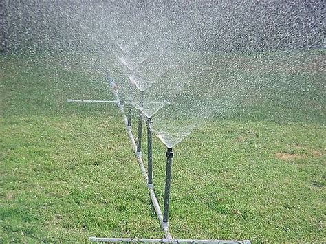 The first thing a diy sprinkler system will do is save you money. Homemade PVC Water Sprinkler | Water sprinkler, Sprinkler diy, Garden watering system