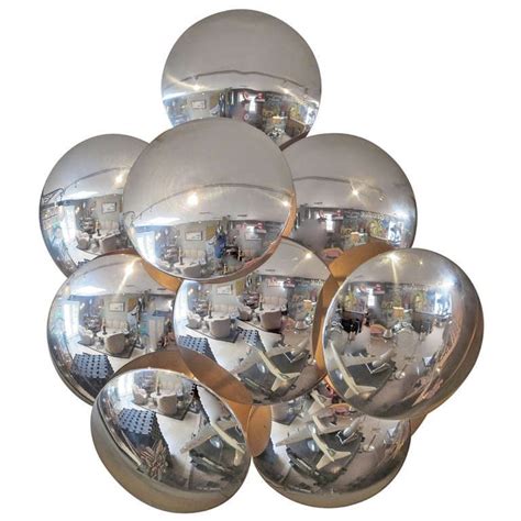 I installed this in my master bathroom. 1960's Chrome Bubbles Wall Sconce by Reggiani at 1stdibs