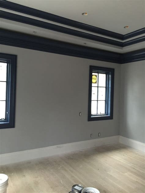 Best wall color for light wood floors. Grey and navy blue room