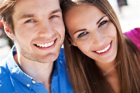 Young Couple Smiling Stock Photo By ©pikselstock 26888831