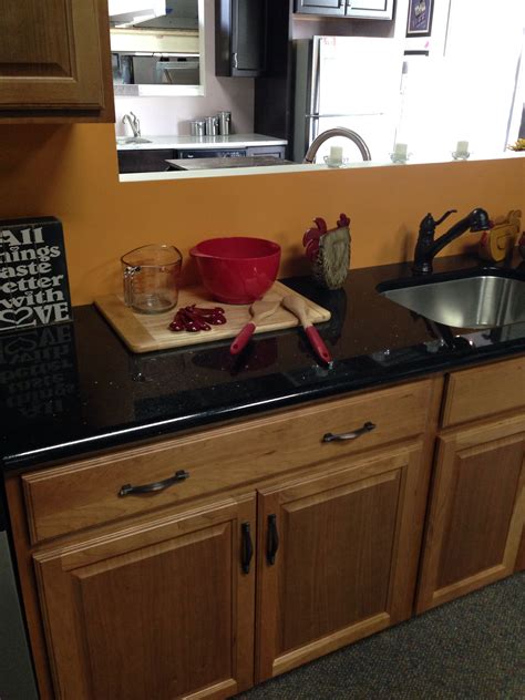 Kitchen colors with honey oak cabinets and black countertops. Black countertop with oak cabinets | Oak cabinets, Kitchen ...