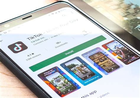 Download TikTok begins content policing, reports taking down hate ...