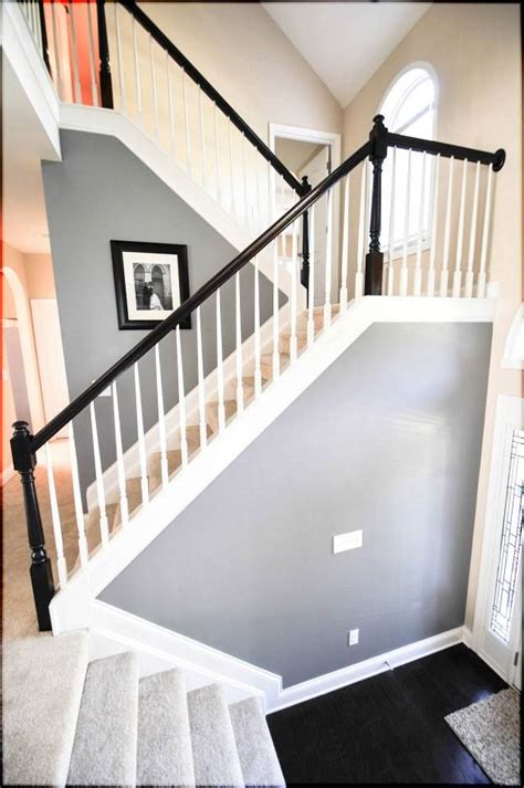 Agreeable gray by sherwin williams is definitely one of my top favorite colors for walls. Pin by Jesse Rohr on Decorating da new casa | Grey walls, Black stair railing, Black stairs