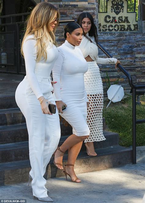 kim khloe and kourtney kardashian dressed in white fashionsizzle