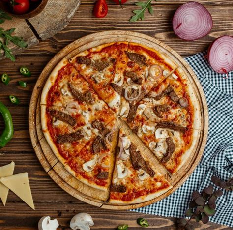 Beef Mushroom Pizza With Onion And Cheese On Wooden Plate Paid