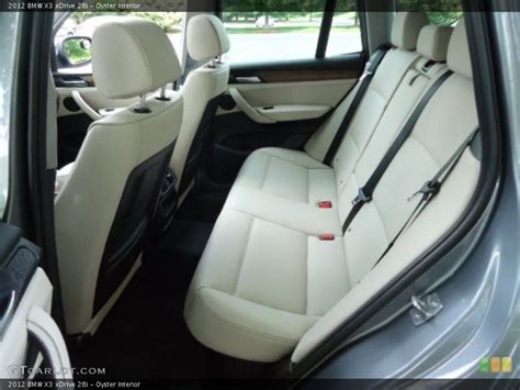 Genuine wood instrument panel insert. Oyster Interior Rear Seat for the 2012 BMW X3 xDrive 28i #64848544 | GTCarLot.com