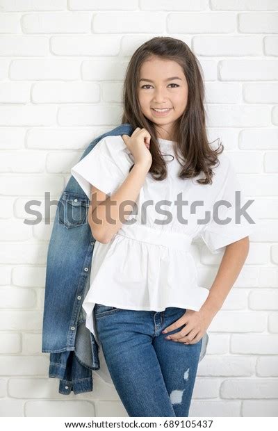 Portrait Happy Cute Girl Blue Jeans Stock Photo 689105437 Shutterstock
