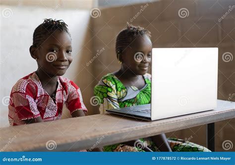 Smiling African Children Working With Laptop Computer In School Stock