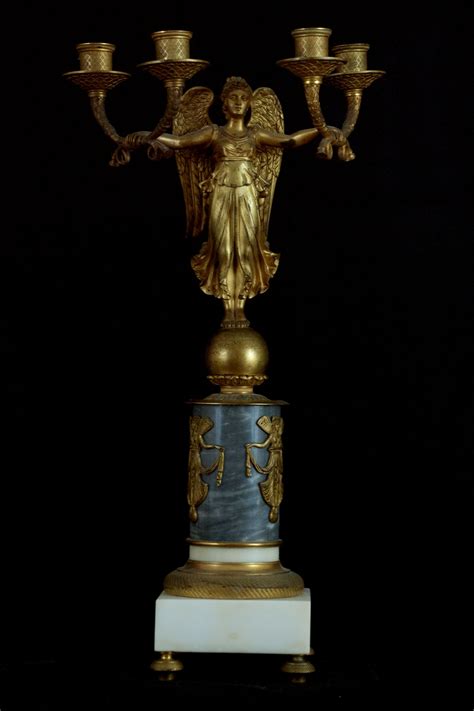Antique cherub lamp hollywood regency set of two brass glass and marble 1930s cherub lamps are somehow controversial decor accessory, but when two authentic vintage pieces from 1930s are in game, things change! - Pair of Dore Bronze & Marble Figural Candelabra ...