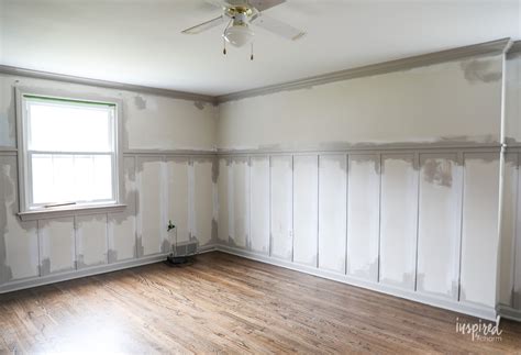 This diy board and batten accent wall is inexpensive and it makes a huge statement!! How to Install Board and Batten - One Room Challenge Week 2