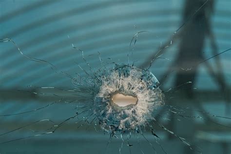 Bullet Hole In Glass Authentic Shot Closeup Isolated On White