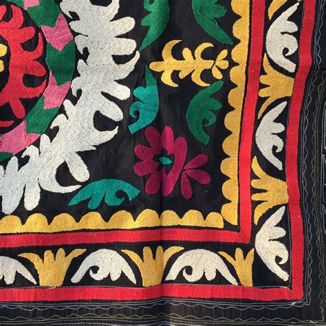 Vintage small Suzani ethnic textile, tajik silk embroidery on cotton.