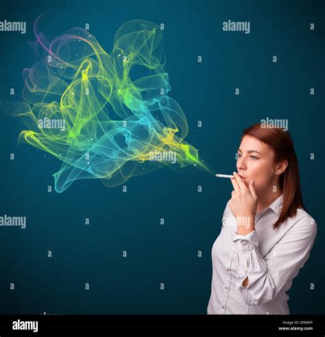 Pretty Lady Smoking Cigarette With Colorful Smoke Stock Photo Alamy