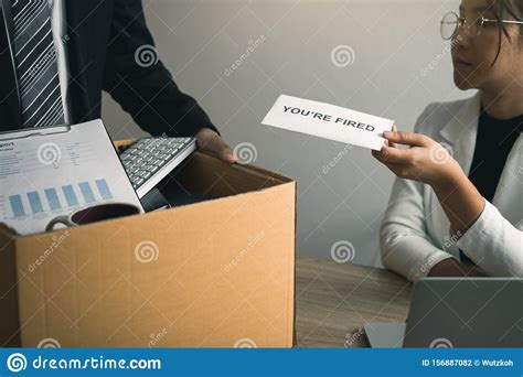 Check spelling or type a new query. Female Manager Submits A Resignation Letter Or Envelope To The Male Employee At The Office Stock ...