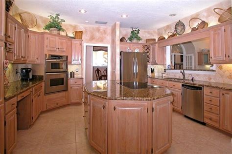 Learn how to clean pickled oak cabinets to protest the sheen. Kitchen cabinets and paint????