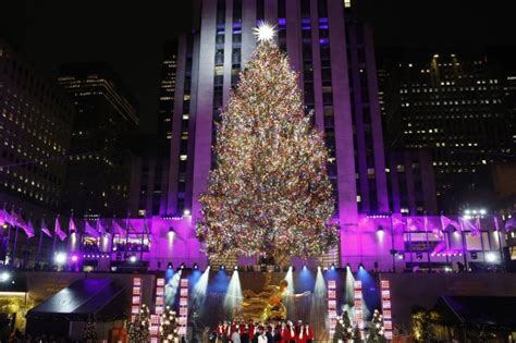 Rockefeller Center Tree Sparkles To Life In Nyc
