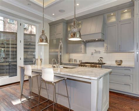 Contrasting with deep blue cabinets under the island and topped with a white, reflective. Grey Cabinets White Countertops Home Design Ideas ...