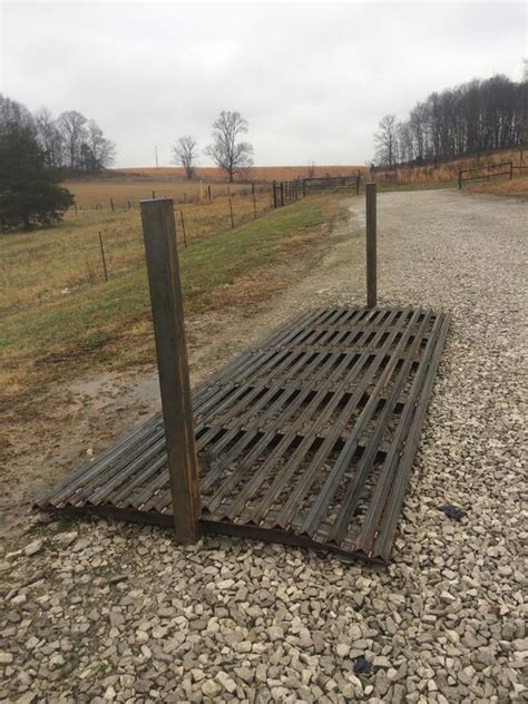 Building concrete footings for a cattle guard hole dug with a john deere 317 skid steer skidpro stump bucket used as a «backhoe» 3 видео cattle guard footings канала lewis renovation & repair. Cattle guard - Coffee Shop - Red Power Magazine Community | Cattle gate, Livestock fence, Cattle