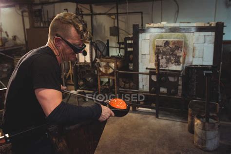 Glassblower Forming And Shaping Molten Glass At Glassblowing Factory — Hot Manufacturing