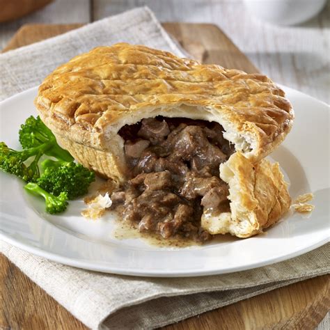 Steak and kidney pie is a british dish with a filling of diced beef and kidneys in a thick sauce. WRIGHTS Steak & Kidney Puff Pastry Pies