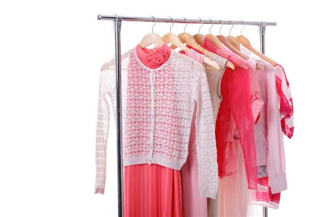 Pink Womens Clothes On Hangers On Rack In Fashion Store Closet Stock