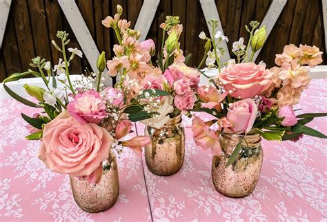 Ageomet 34pcs artificial rose flowers, 24 fake flowers and 10 artificial eucalyptus leaves stems in bulk silk flowers bouquet, for home bridal wedding party festival decor 4.6 out of 5 stars 591 $14.99 $ 14. Pink and gold small centerpiece | Rose gold centerpiece ...
