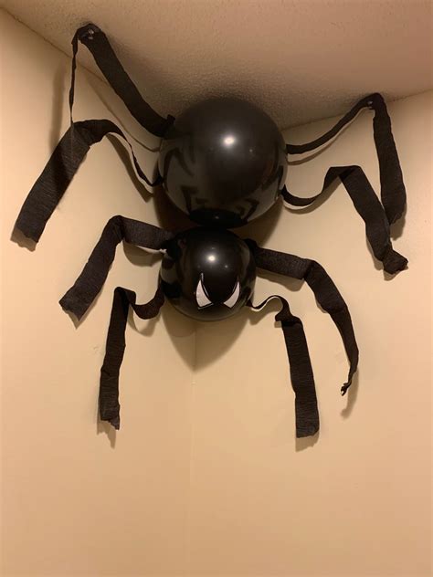 Made With Two Balloons Black Streamers And Spider Man Eyes Printed
