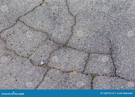 Old And Cracked Road Surfaces Are Used To Create The Background And
