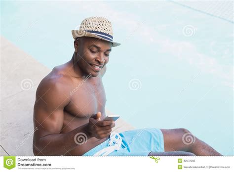 Handsome Shirtless Man Texting On Phone Poolside Stock Image Image Of