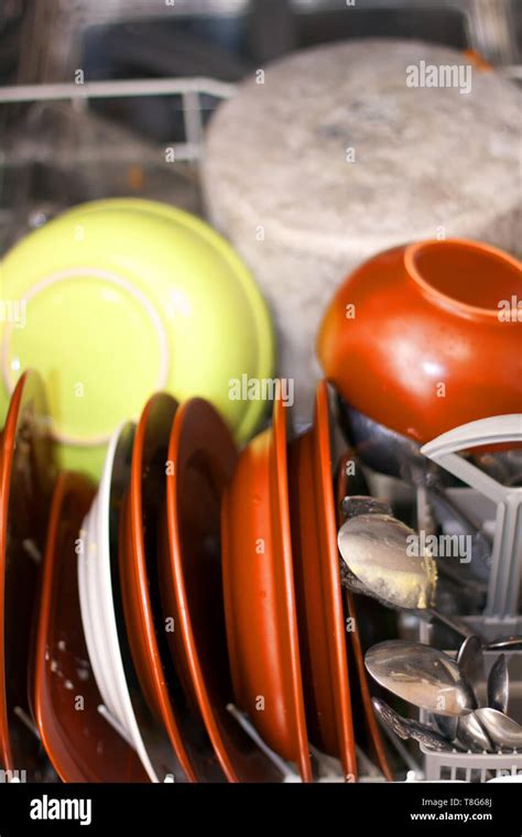 Very Dirty Dishes In The Dishwasher Stock Photo Alamy