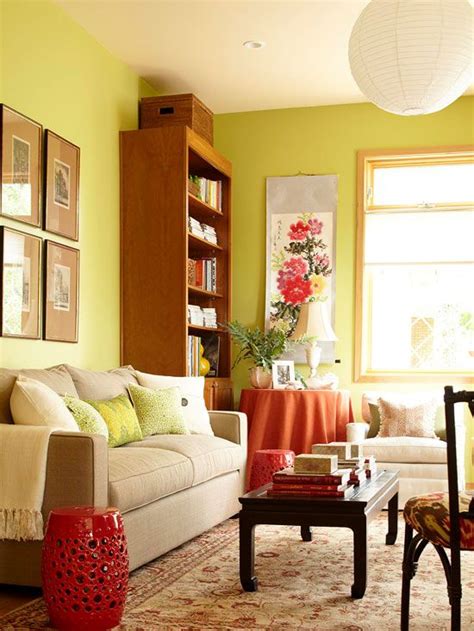 A Living Room Filled With Furniture And Lots Of Bookshelves On The Wall