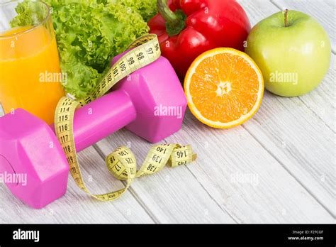 Fitness Concept With Dumbbells And Healthy Food Stock Photo Alamy