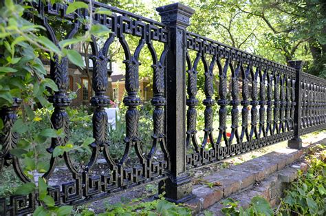 Garden fencing serves all sorts of purposes. Home | HousEvolve | Wrought iron fences, Fence design ...