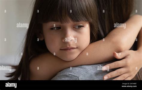Pensive Little Girl Hug Young Mom Showing Love Stock Photo Alamy