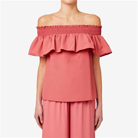Embrace The Off The Shoulder Trend With This Easy To Wear Top With An Elasticised Neckline And