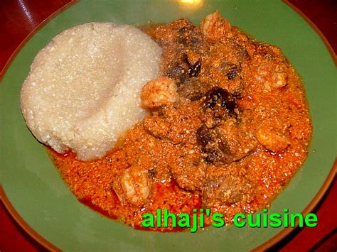 Egusi soup is spinach and melon seeds cooked in palm oil, spices, stock and ones preferred protein. Nigerian Cuisines - Photos And Discussions. - Food (2 ...