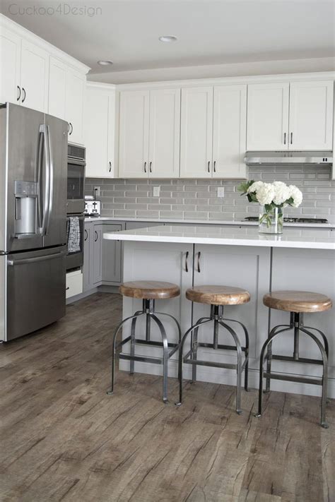 Vinyl sheet and tile are particularly good flooring choices for kitchens because they are able to withstand the common rigors of the space. My friends gorgeous gray and white kitchen | Bloggers ...