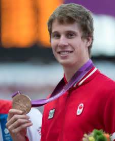 Canada S Derek Drouin Is Presented His Bronze Medal For High Jump At