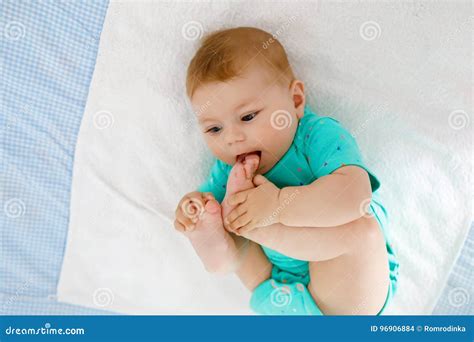 Cute Baby Taking Feet In Mouth Adorable Little Baby Girl Sucking Foot