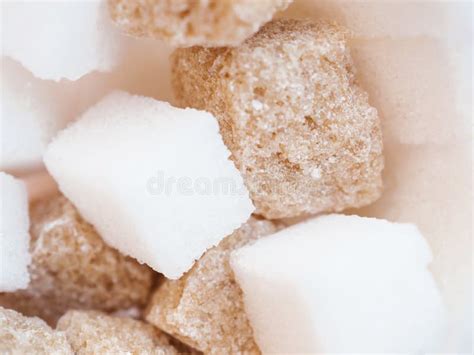 Macro View Of Mixed Raw Lump Sugar Brown And White Sugar Cubes