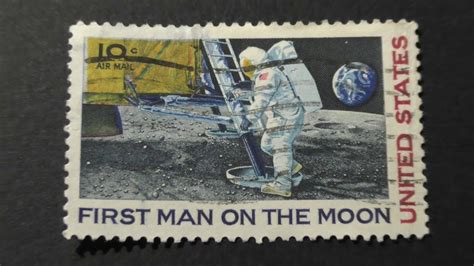 Postage stamp. USA. Air mail. UNITED STATES. FIRST MAN ON ...